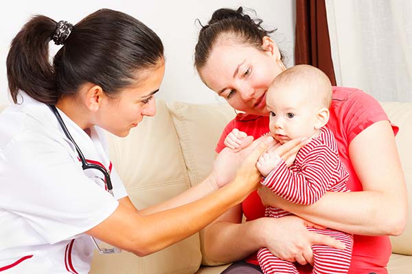 Nurse taking care of baby