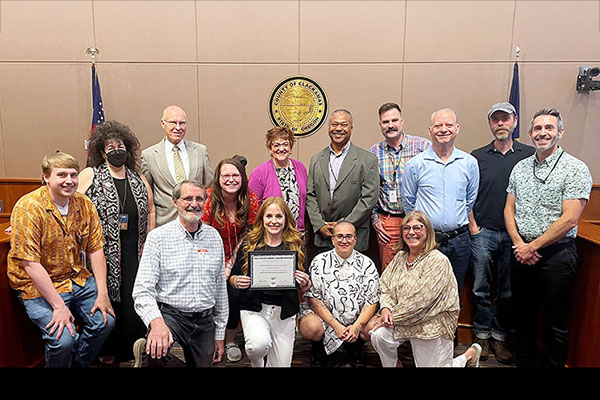 group of people receiving an award