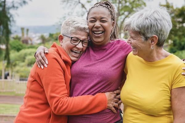 three older women smiling