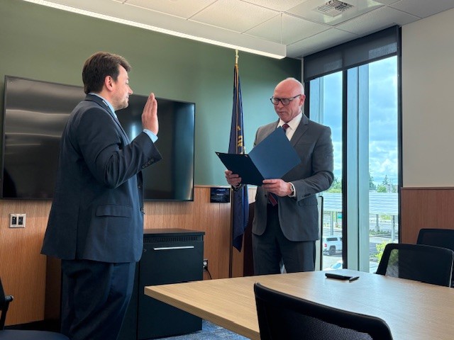 Clackamas County District Attorney John Wentworth swore in Greg Brown