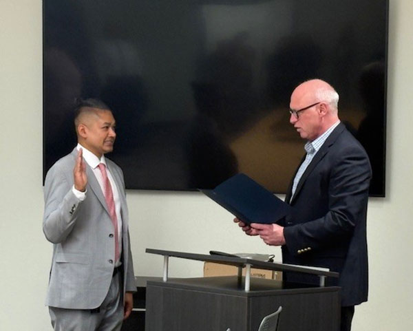 Clackamas County District Attorney John Wentworth swore in Shawn Menon