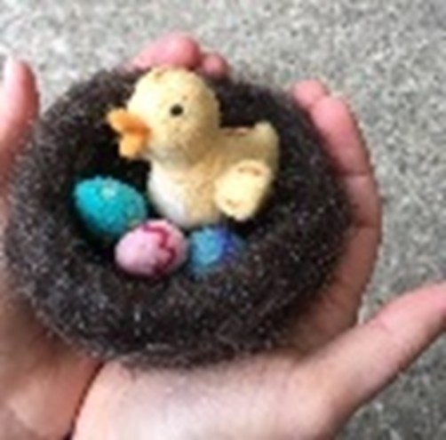 Felted duck in nest